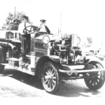 "Bertha" 1923 Ahrens Fox. At Laurel Springs parade. Warren Bubek (driving) and John Revenney.